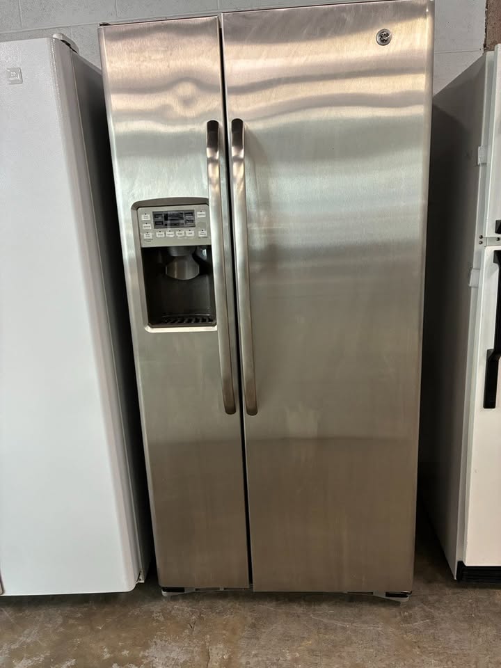 Maytag Side-by-side Refrigerator with Ice Maker and Water Dispenser