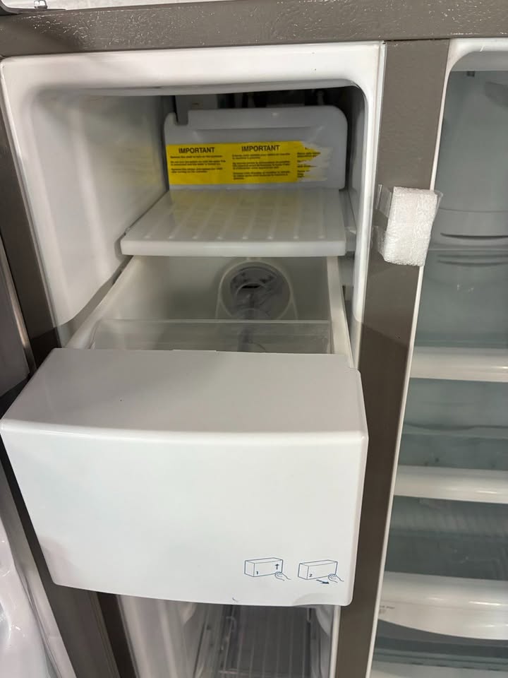 Maytag Side-by-side Refrigerator with Ice Maker and Water Dispenser